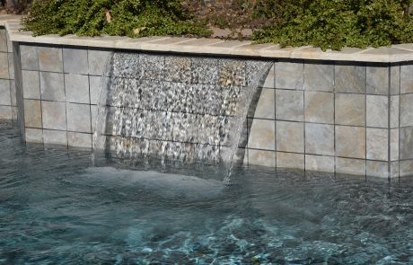 Sheer descent from a tiled raised wall