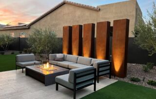 IMG_4467 Patio lounge with a fire table and lit corten-steel panels
